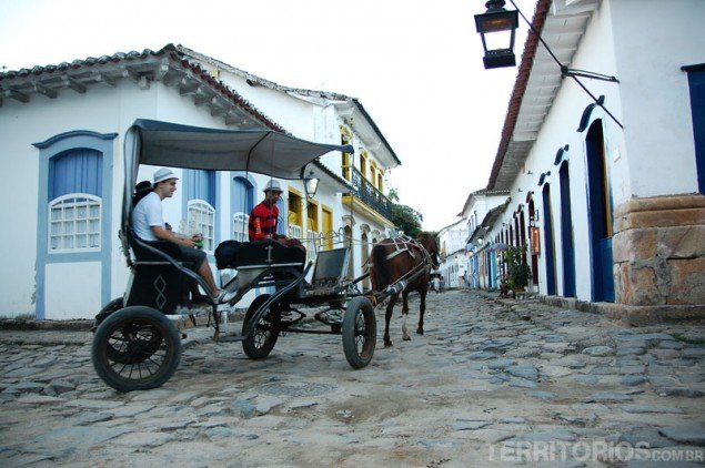 On a horse-drawn carriage at historical centre